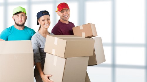 Packing boxes and wrapping materials prepared for a home move in Harrow