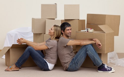 Careful furniture moving in a Harrow residential property