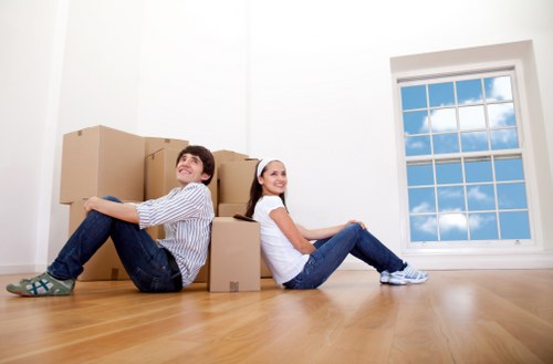 A moving van loaded with boxes for transport in Harrow