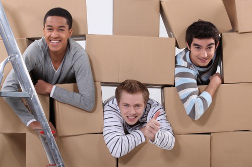Professional movers handling furniture during a Harrow relocation