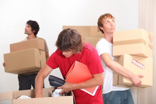 Professional removal van service handling boxes and furniture in Harrow