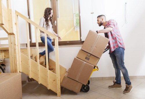 Loading furniture into a removal truck for a Harrow relocation