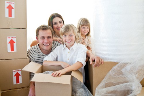 Loading household furniture into a van for a Harrow move