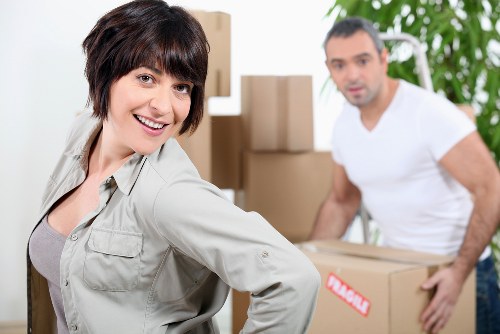 Safe moving practices and clear communication during a Harrow removal