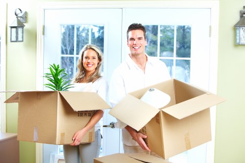 Packing and loading boxes into a moving truck in Harrow
