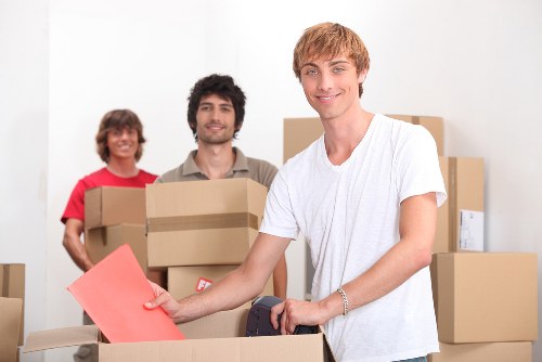 Local student removals service in Harrow loading boxes into a van