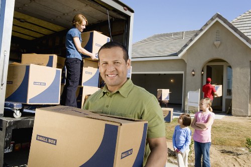 Professional moving van prepared for furniture transport in Harrow